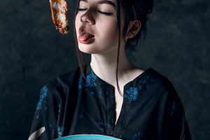Cute girl with eel salad featuring health, tomato, and culture