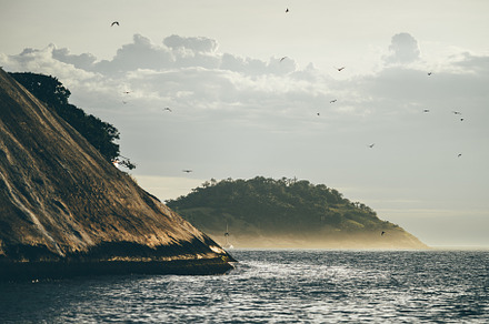 Coastal scene with rocky shore, a Wallpaper Photo by SkyNext