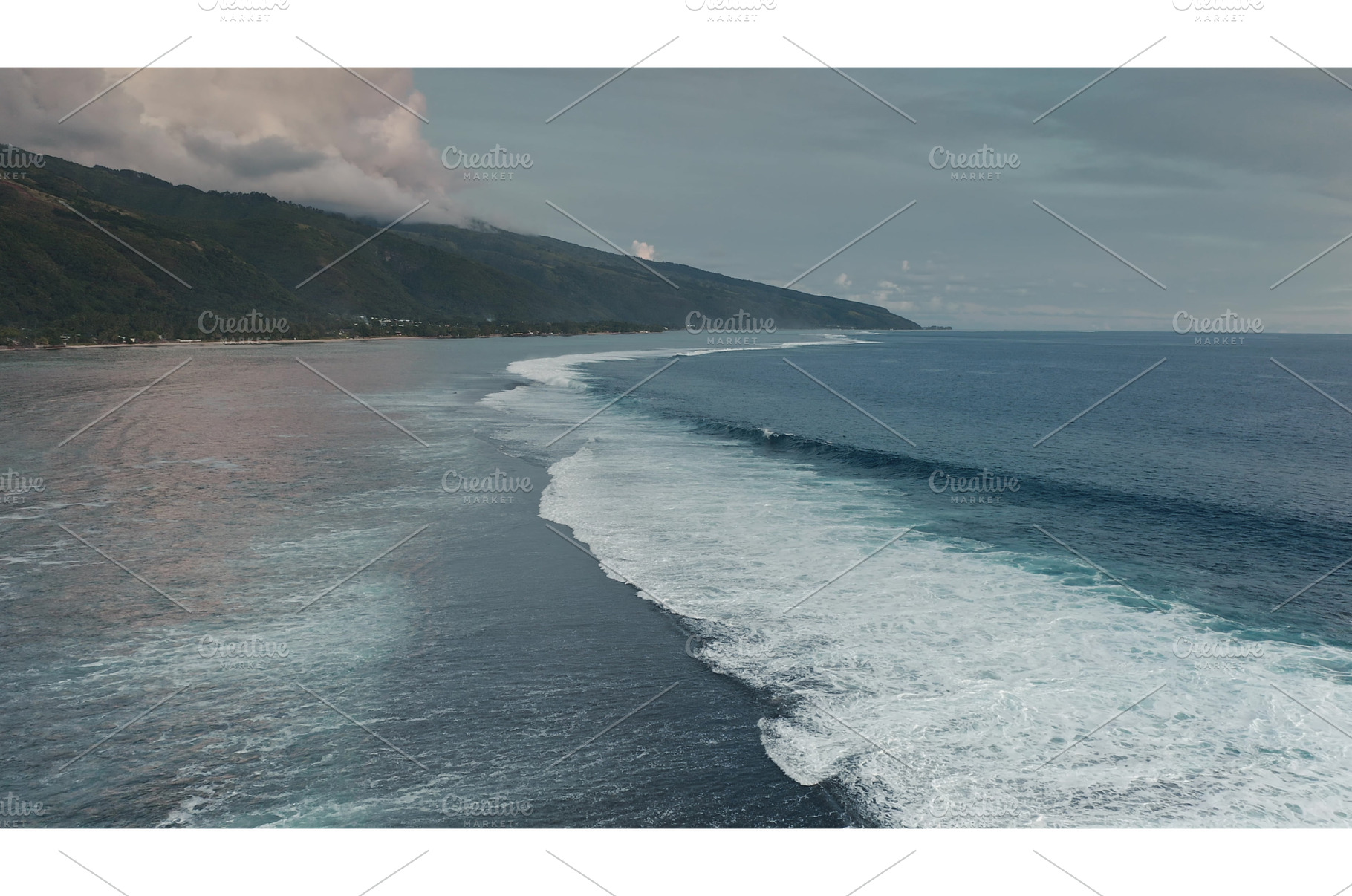 Waves gently rolling onto shore near, a Nature Photo by Goinyk