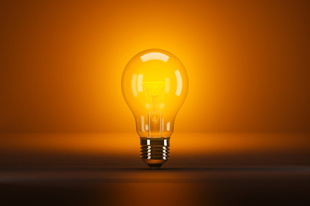 Isolated illuminated light bulb, a Technology Photo by OSORIOartist