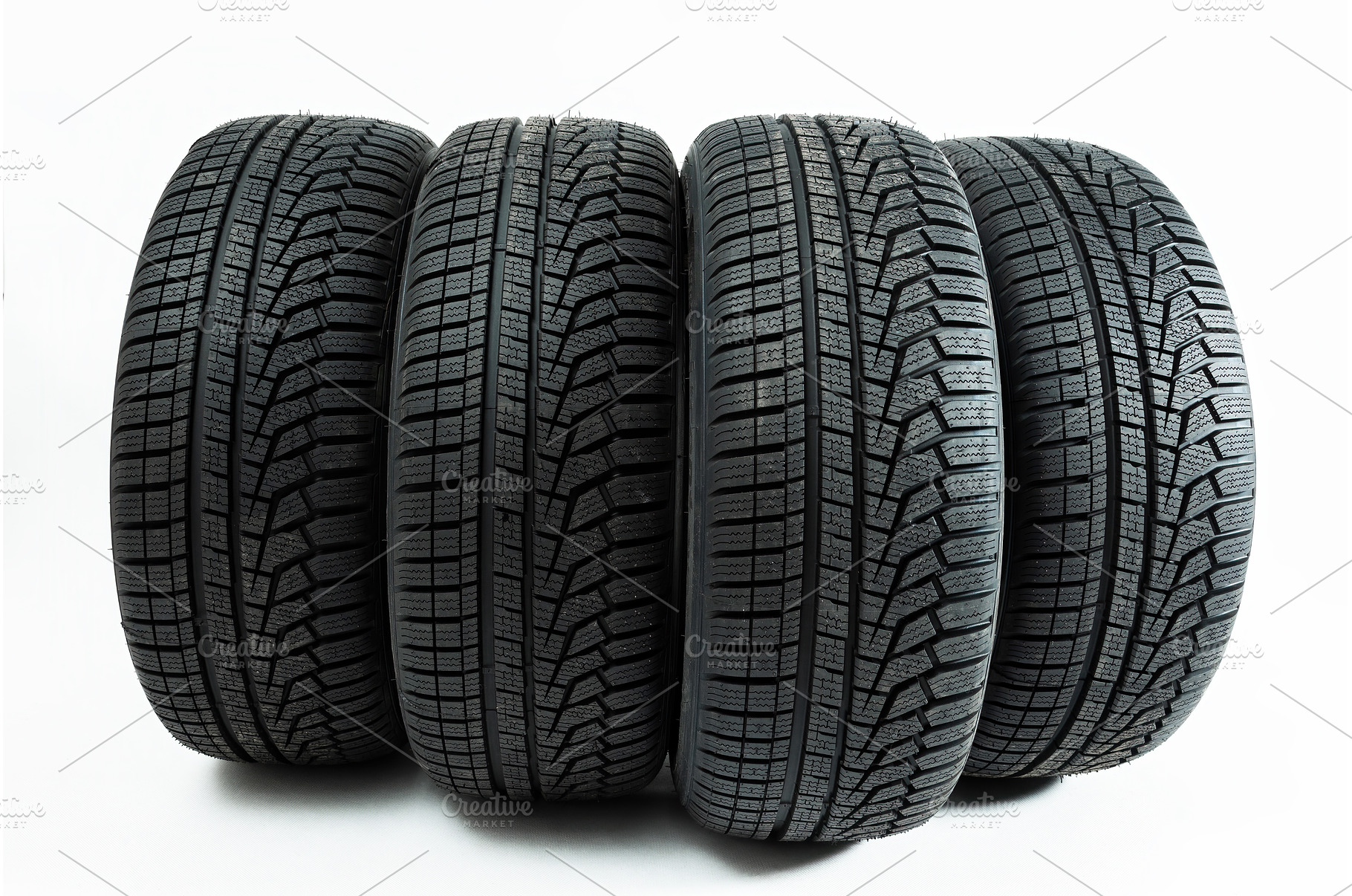 Winter tires rolling forward, a Transportation Photo by WildMedia