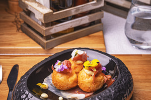 Delicious round potato croquettes, a Photo by Grafvision photography
