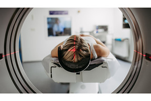 CT scanner view of patient during, a Health & Medical Photo by HalfPoint