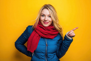 Blond woman wearing a blue jacket, a Photo by Pavel_design