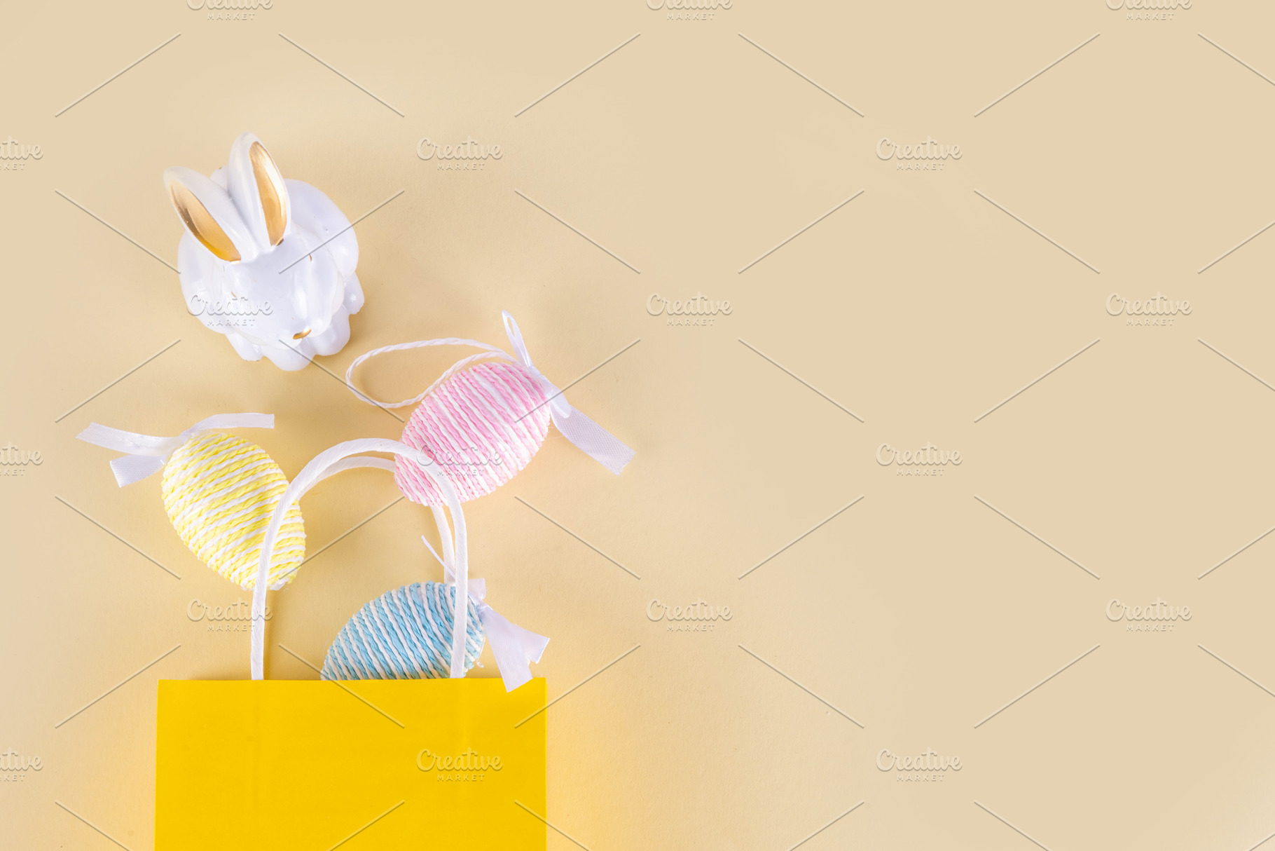 Minimal Easter shopping background with bunny rabbit decor and E, a Holiday Photo by Rimma