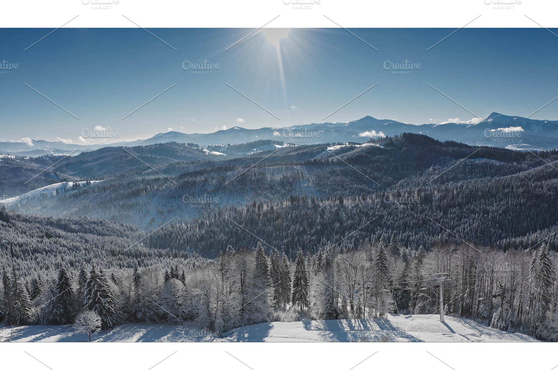 Sun shining over snow covered, a Nature Photo by Goinyk