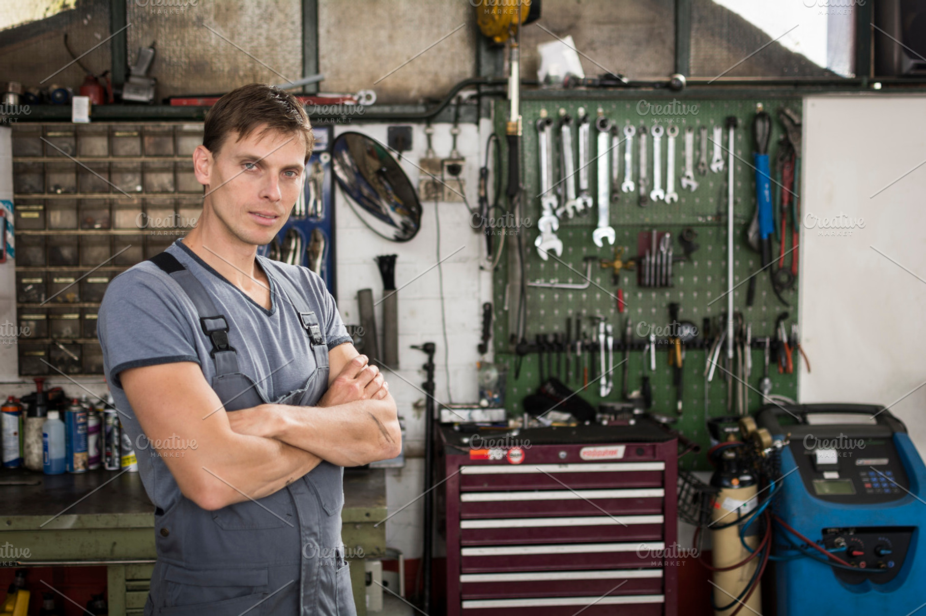 Garage worker stock photo containing automotive and dirty, an Industrial Photo by Twin Design