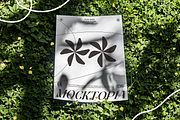 A3 Poster Mockup on Grass, an Advertising Mockup by Mocktopia (Thumbnail 2 of 8)