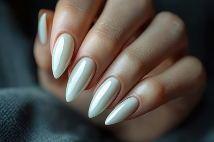 Elegant long nails with creamy white, a Background Photo by Pixeness