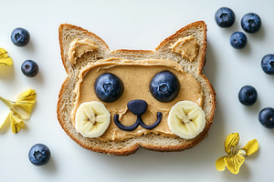 Fun breakfast toast cat face shape, a Photo by Pavel_design