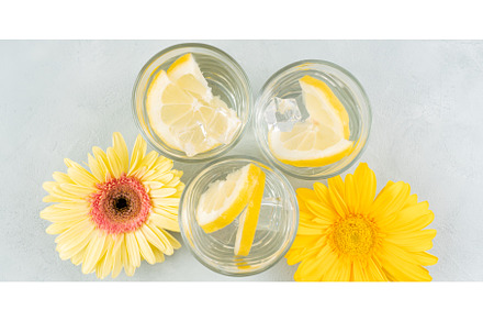 Lemon water drink with ice cubes on, a Food & Drink Photo by Lifemorning