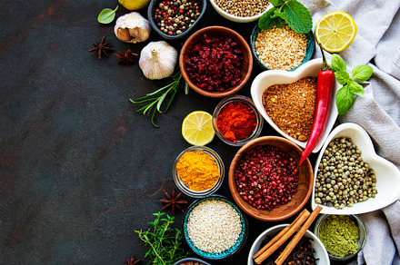 Various spices in a bowls on a black stock photo containing spice and, a Food & Drink Photo by Olena Rudo