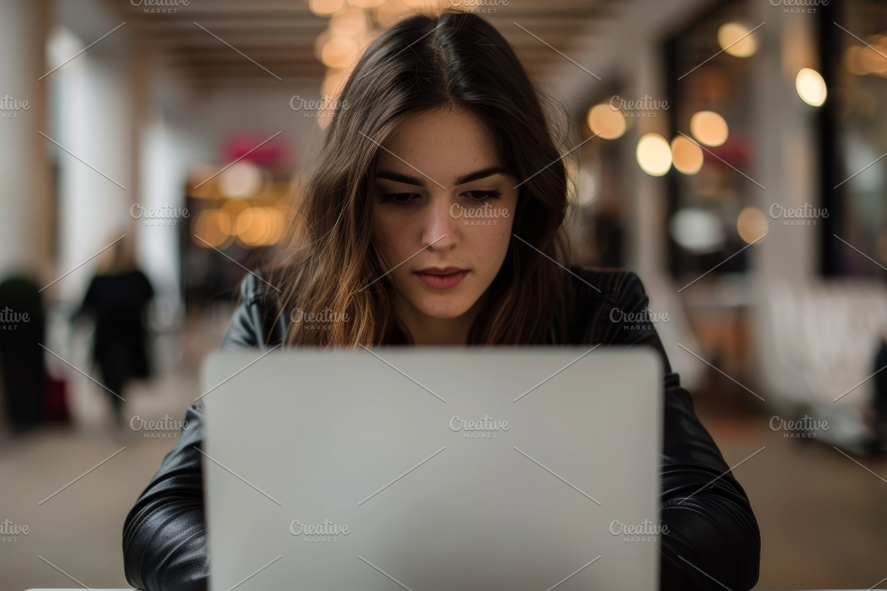 A white woman sitting in front of a, a Photo by Iftikhar Alam