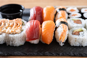 Assorted sushi platter with nigiri and rolls, a Food & Drink Photo by etorres69