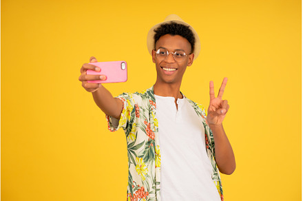 Young tourist man taking selfies, a Person Photo by Mego-studio
