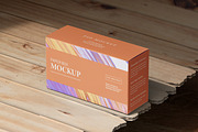 Paper Box Mockup Under Daylight Eco, a Merchandise Mockup by Ram Studio LLC (Thumbnail 1 of 4)