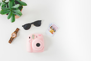 Feminine Desk Instax Plant. Flatlay