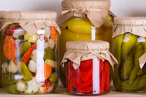 Homemade preserved and fermented food, pickled and marinated veg, a Food & Drink Photo by Antonina Vlasova