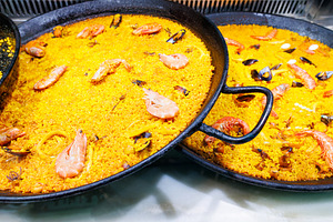Delicious traditional Valencian seafood paella, a Food & Drink Photo by Bepslabor