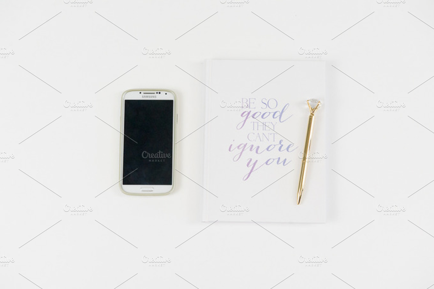White notebook with phone on desk containing desk, rebecca nash photography, a Business Photo by Rebecca Nash Photography