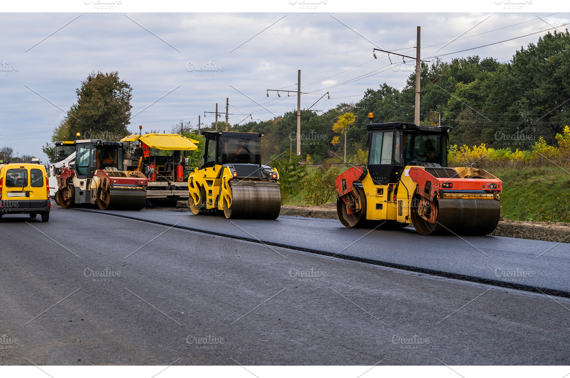 Heavy Asphalt Road Roller with Heavy, an Industrial Photo by volodymyrshtun13795
