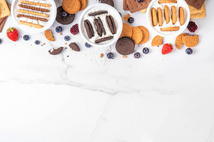 Set of different trendy yogurt and cookie dessert, a Food & Drink Photo by Rimma