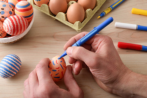 Hand Decorating Easter Egg with Colorful Marker, a Holiday Photo by Davizro's Market