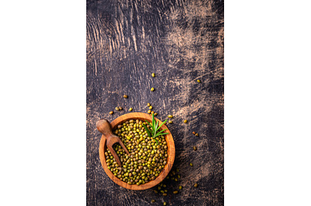 Raw uncooked mung beans on black, a Food & Drink Photo by Yulia Furman