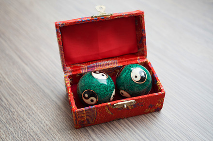 Close-up of Yin Yang balls in box