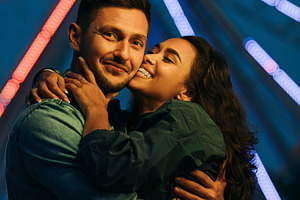 Young couple hugging and kissing, a Person Photo by Artem Varnitsin