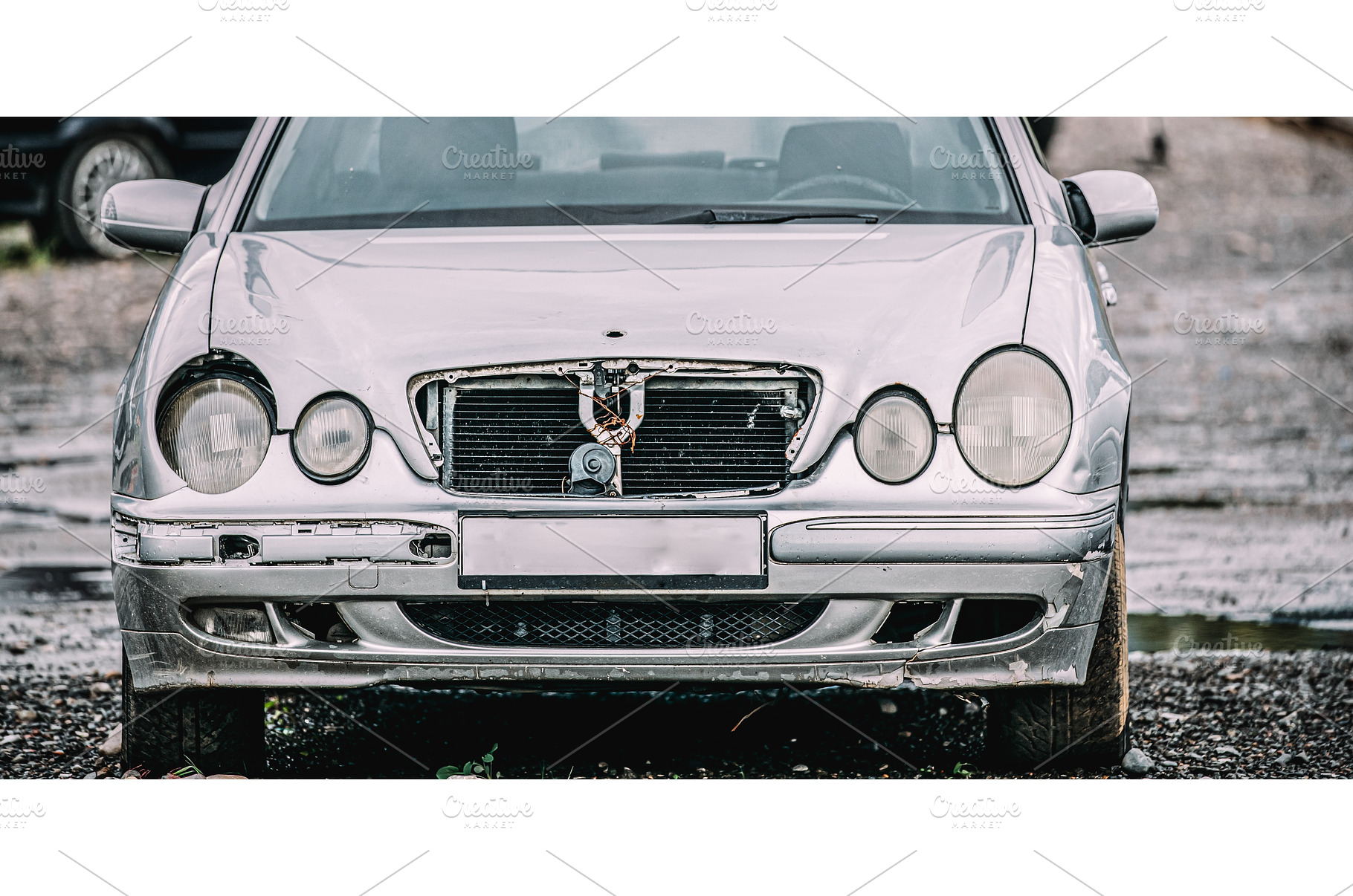 Gray Color Luxury Car With Damages, a Transportation Photo by Our Amazing World