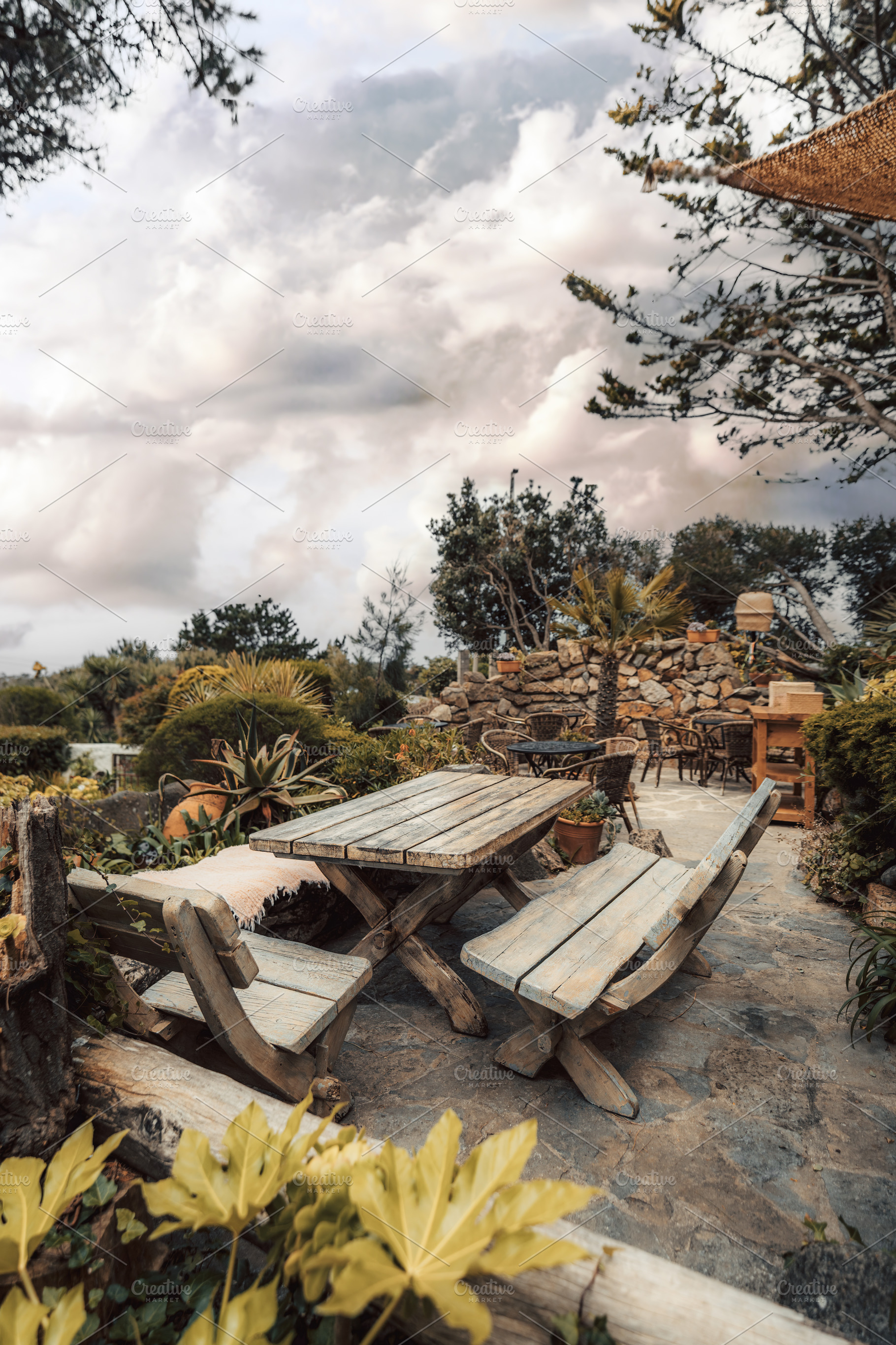 Rustic patio with wooden benches, an Architecture Photo by SkyNext