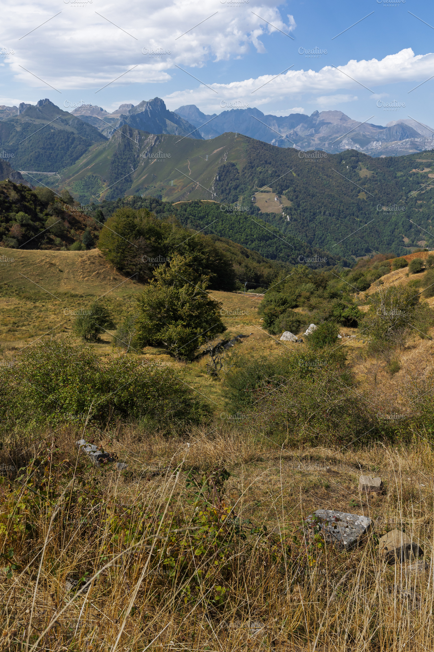 Mountain landscape with green hills, a Nature Photo by Perpis
