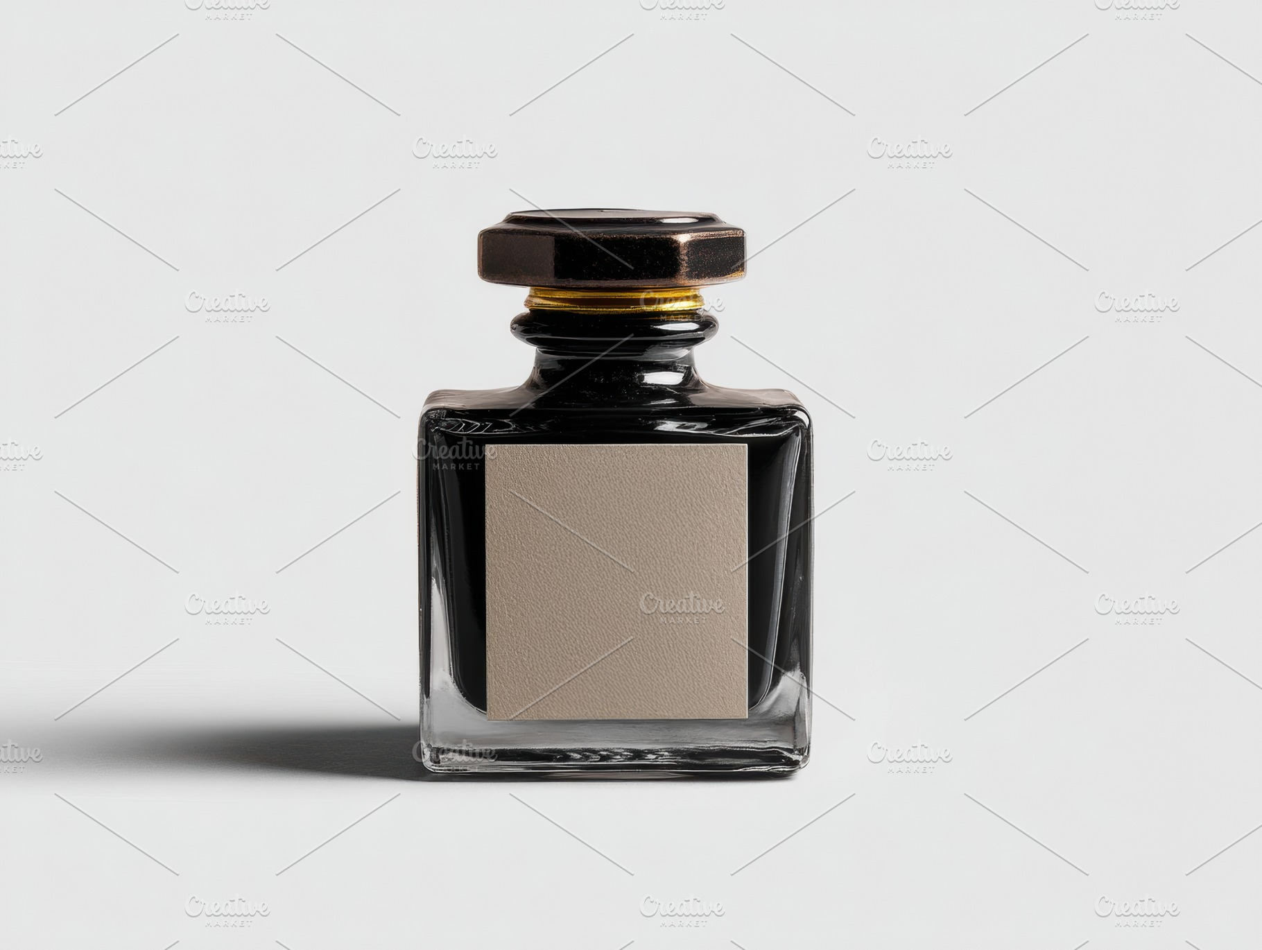 Black ink bottle on white background, a Beauty & Fashion Photo by Virgo Studio