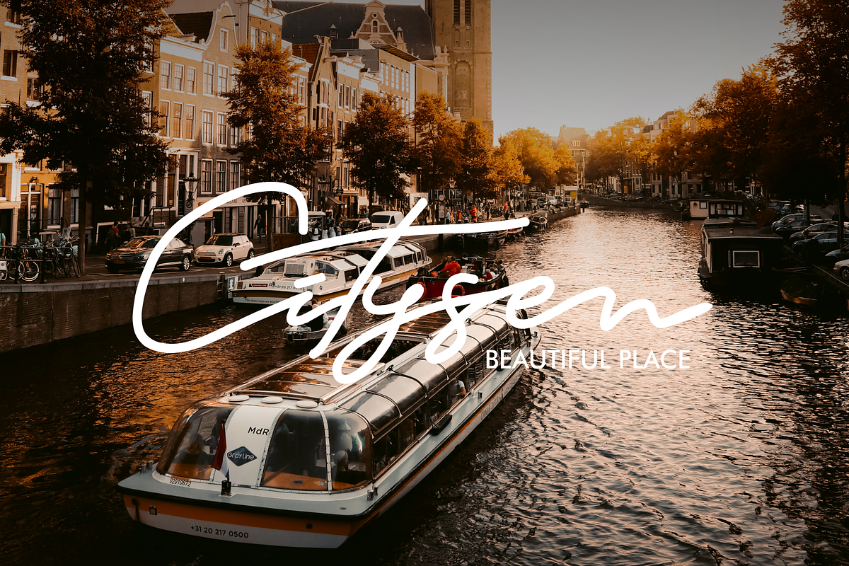 Satdam - Signature Script, a Script Font by Vroz Studio (Photo 3 of 8)