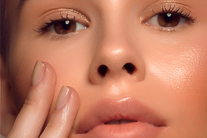 Elegant close up portrait with expressive hand gesture, a Person Photo by DanFLCreativo