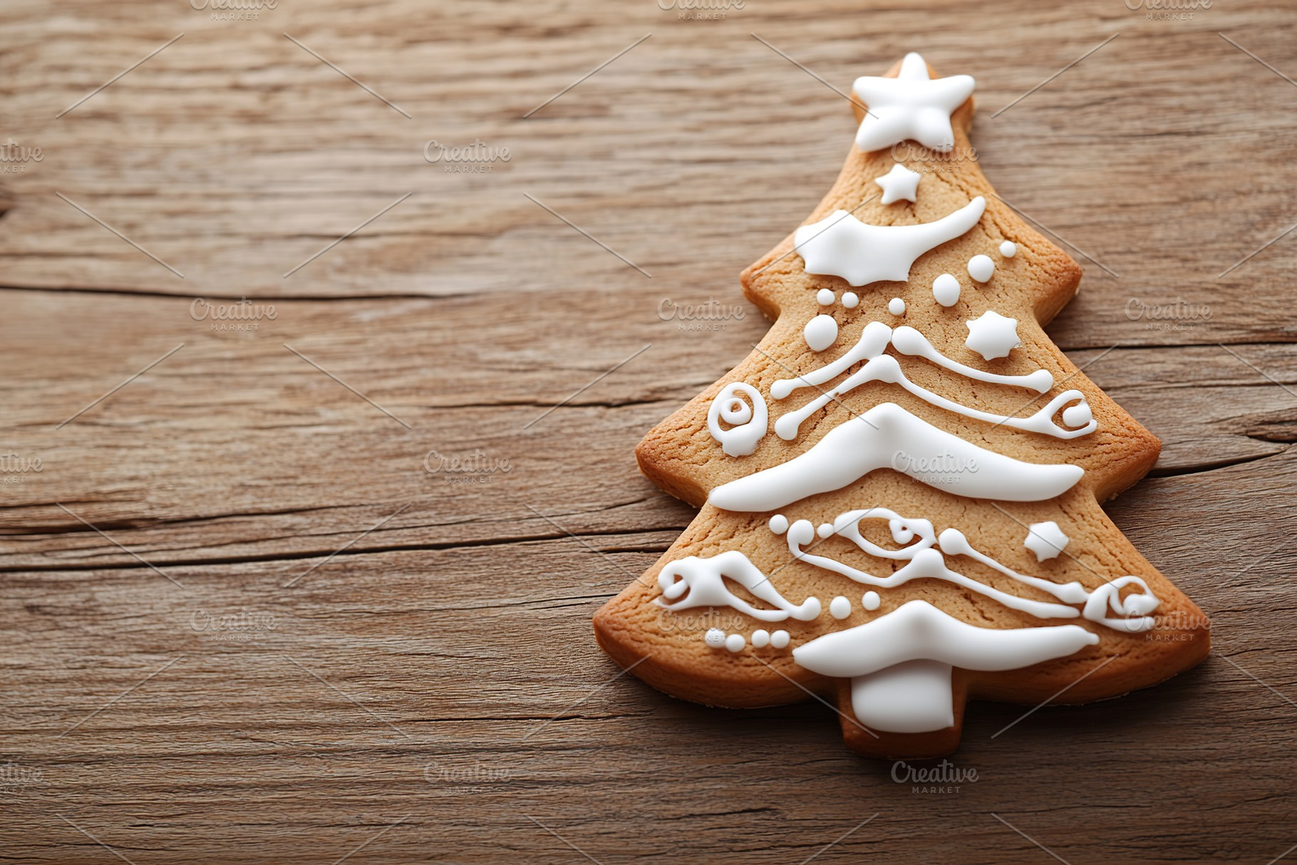 Christmas gingerbread fir tree cookie on wooden table, a Holiday Photo by AlyaAnd
