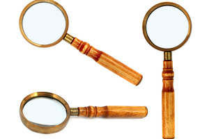 Old style magnifying glass isolated, a Photo by saiko3p