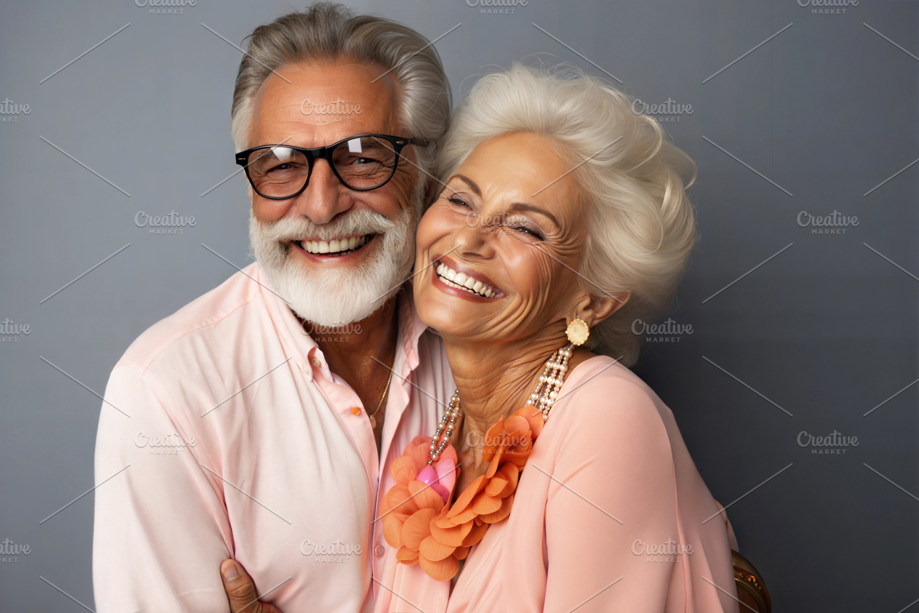 Happy senior couple smiling and embracing on a grey background., a Person Photo by ImageMir