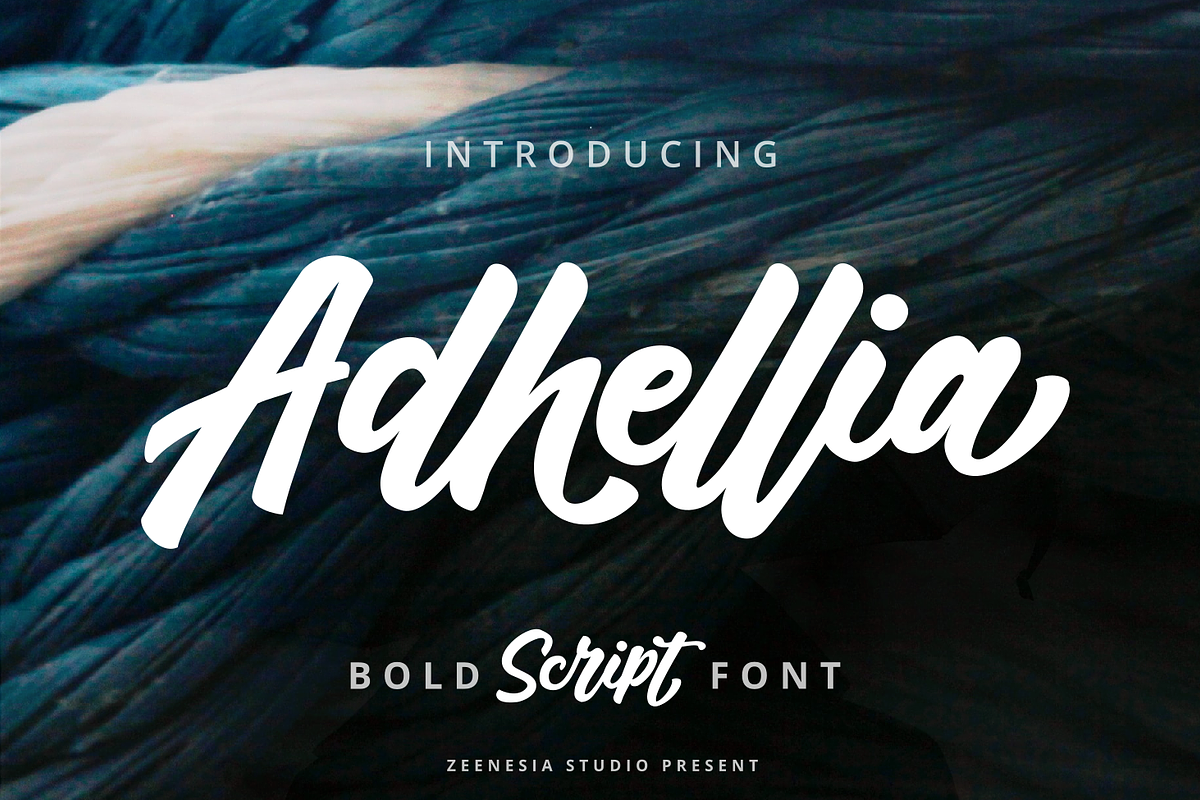 Adhellia - Bold Script Font, a Script Font by zeenesia (Photo 1 of 11)