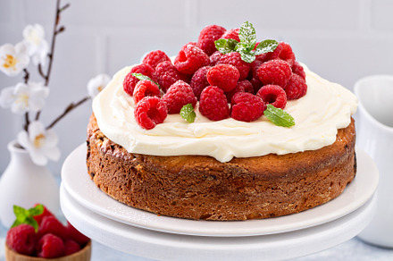 Simple summer cake with raspberries and frosting, a Food & Drink Photo by farwasser