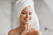 Healthy skin, care and moisturizing concept. Happy caucasian lady with towel on, a Photo by Prostock-Studio (Thumbnail 1 of 2)