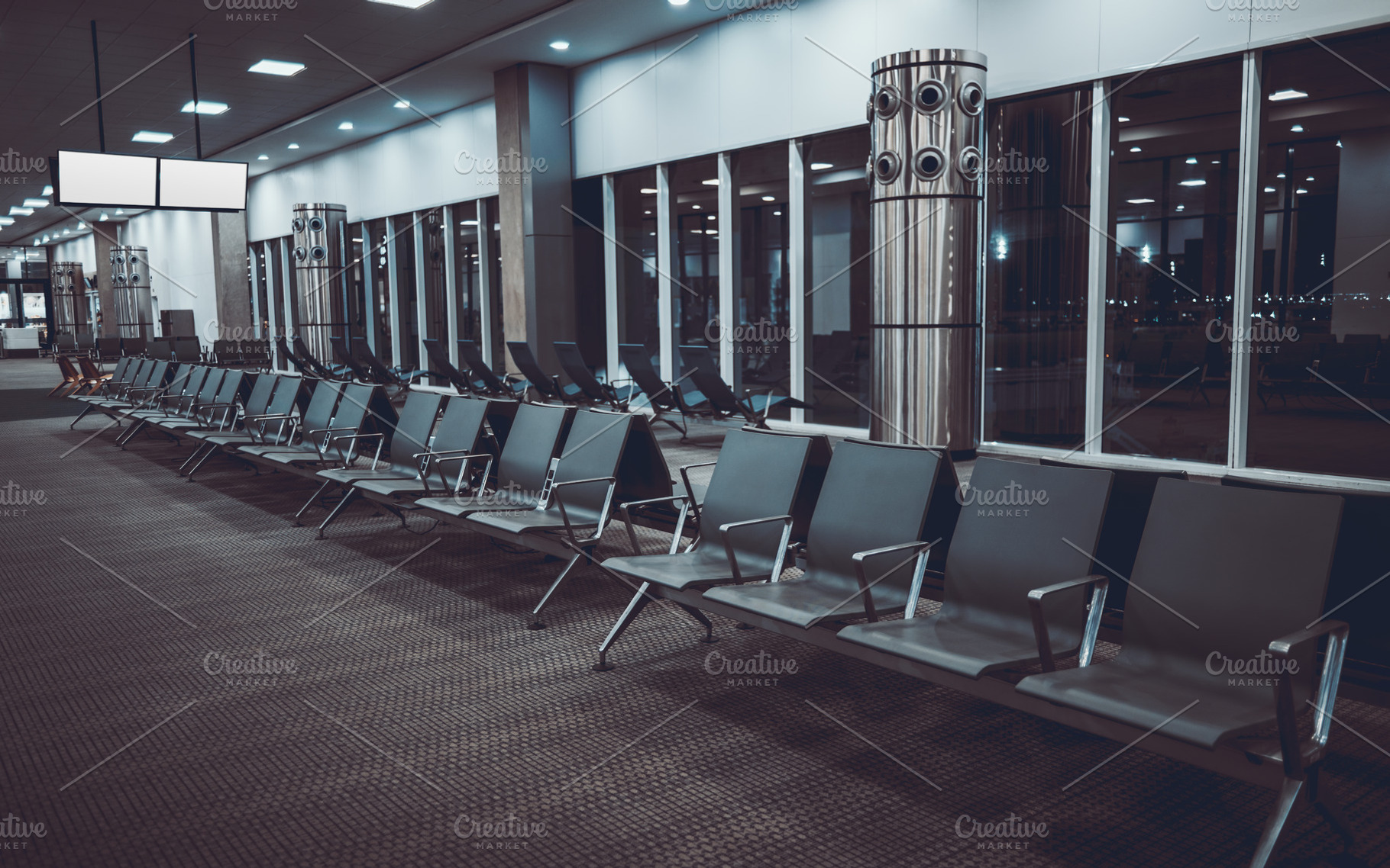 Empty airport gate seating at night, an Architecture Photo by SkyNext