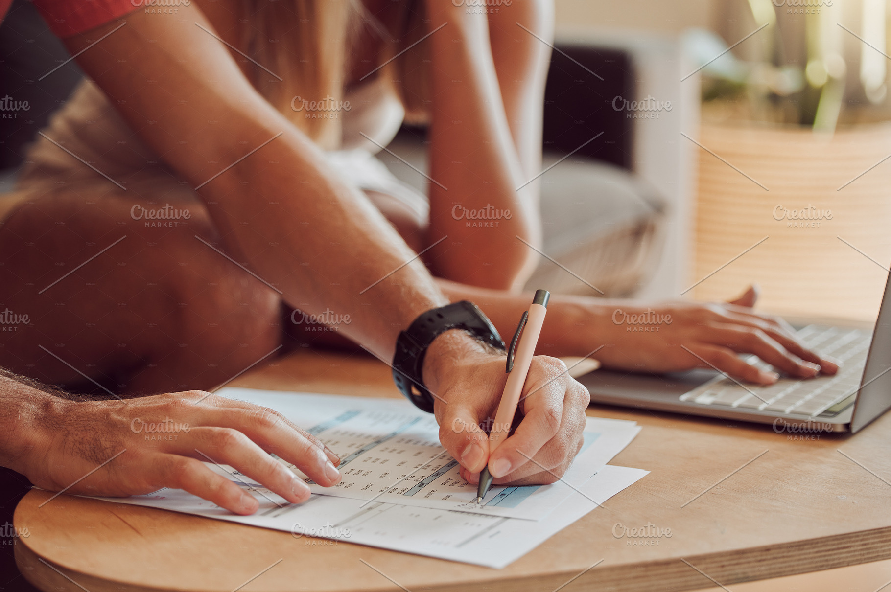 Couple calculating budget, finance and tax while planning investment, loan and bills on writing paper and laptop at home. Managing household spending, savings and insurance report for online banking, a Photo by Peopleimages.com