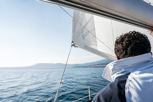 Sailor yachting in open sea with cle, a Photo by Dvoevnore photos