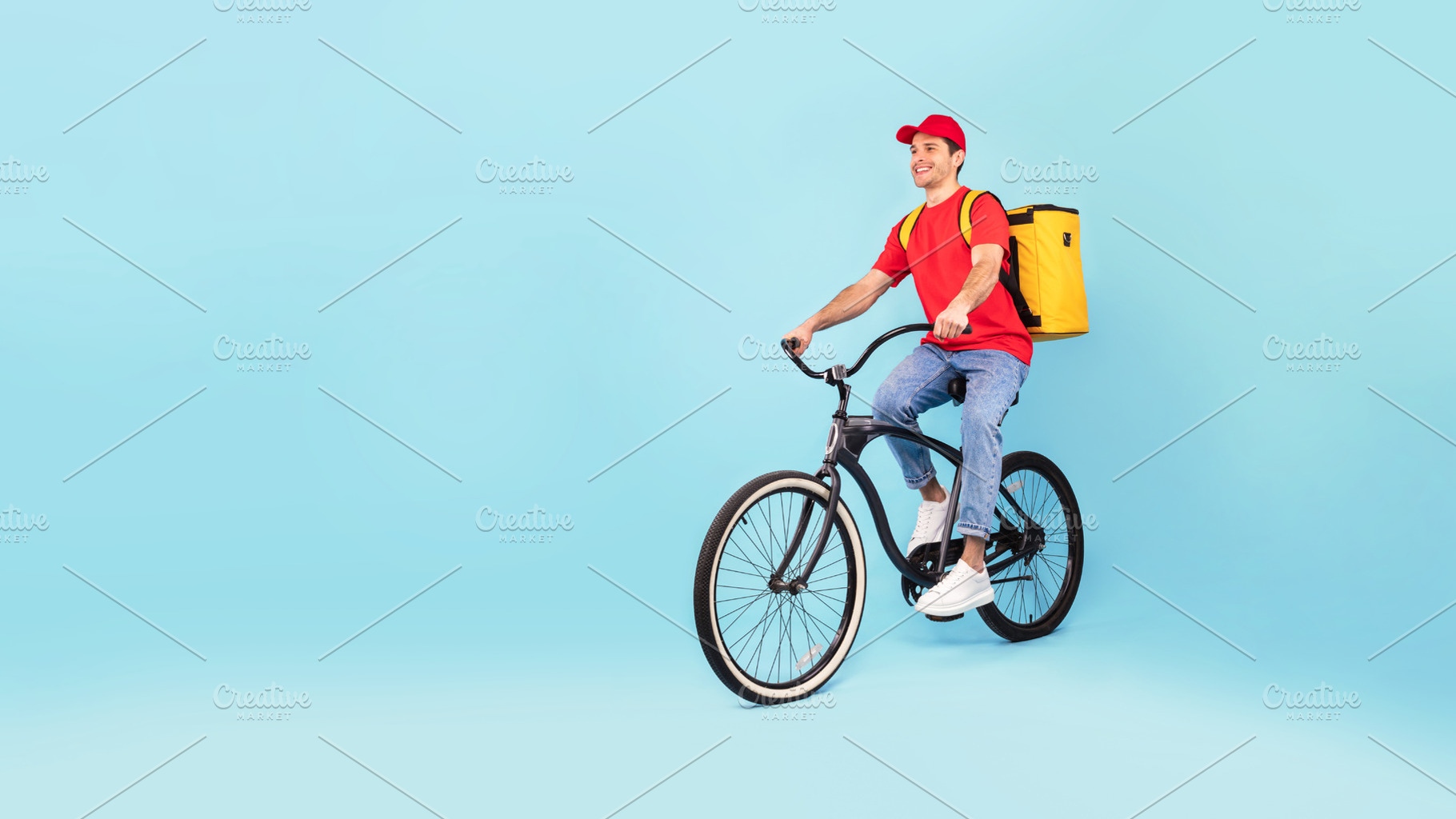 Courier Man With Backpack Riding Bike Delivering Food, Blue Background, a Photo by Prostock-Studio