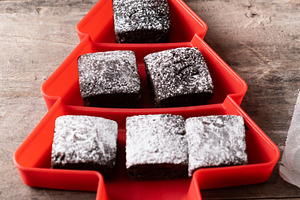 Chocolate brownies with powdered sugar in Christmas tree tray, a Food & Drink Photo by etorres69