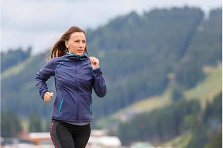 Young slim woman running on the road, a Sports & Recreation Photo by serkum