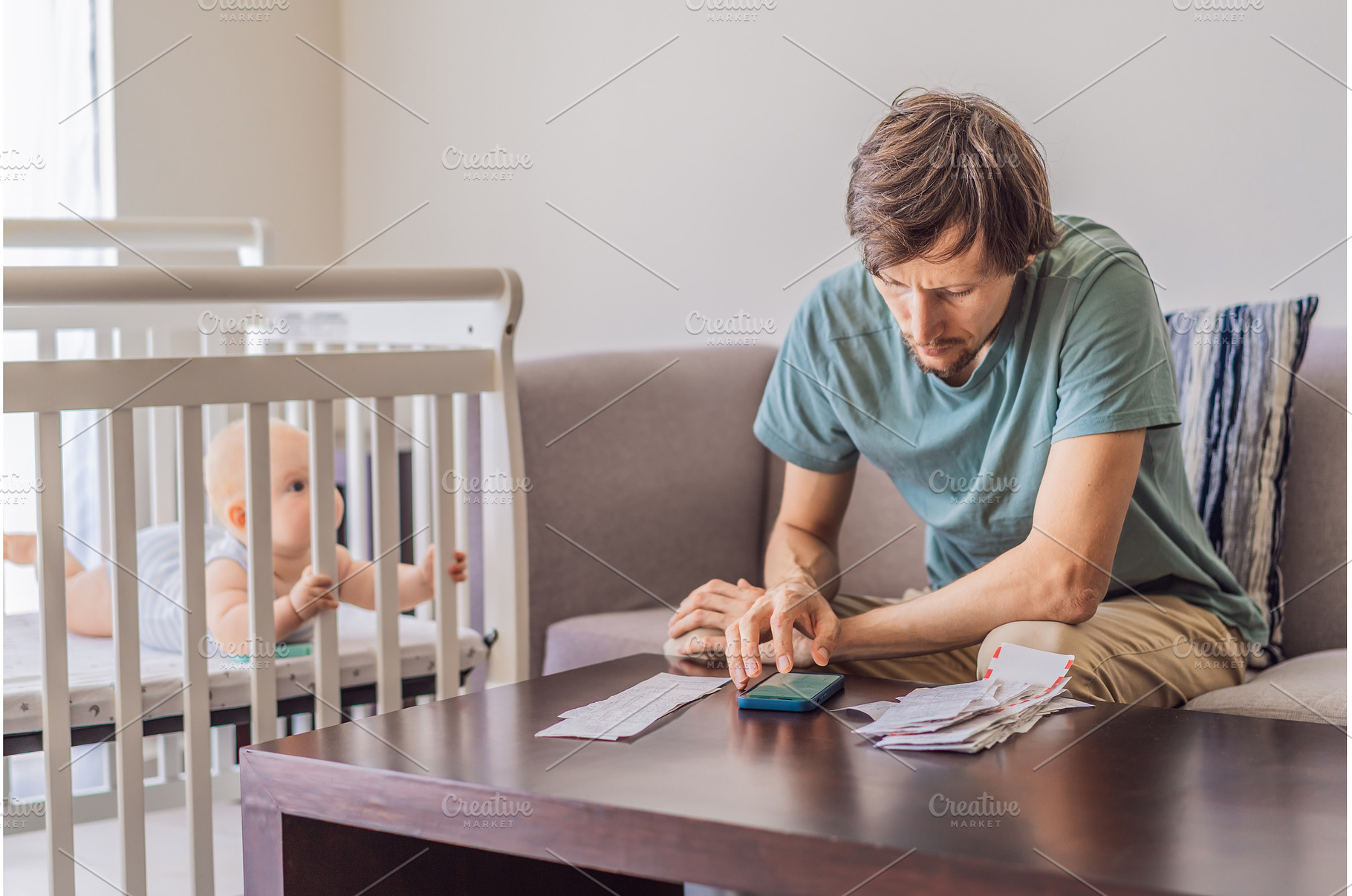 Father sitting on sofa calculating, a Person Photo by Elizaveta Galitskaya