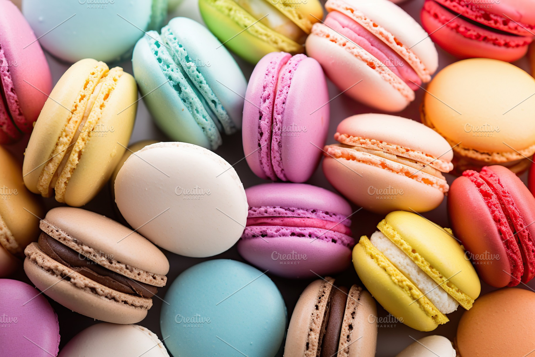Colorful macarons dessert background, a Food & Drink Photo by AlyaAnd